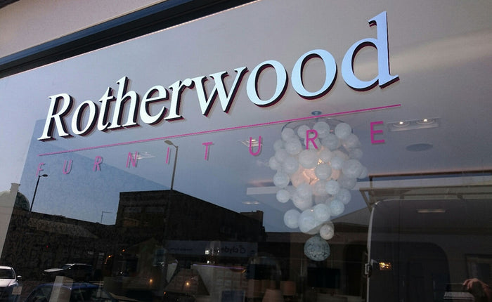 Premium vinyl shopfront sign installed on glass vibrant clean edges Perth - Neon Brothers