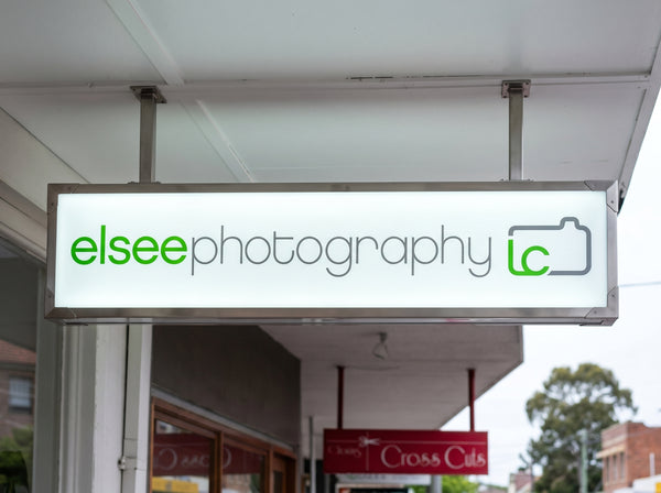 Elite tier vinyl sign example - Neon Brothers